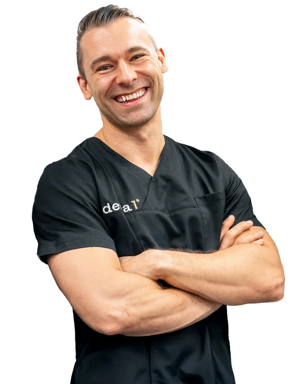 Dr. Stefan Helka als Zahnarzt im schwarzen Denta1-Kasack